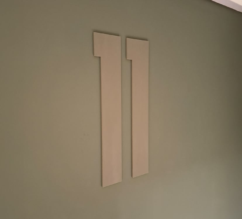 numeros de mdf pintados para indicar pisos en edificios